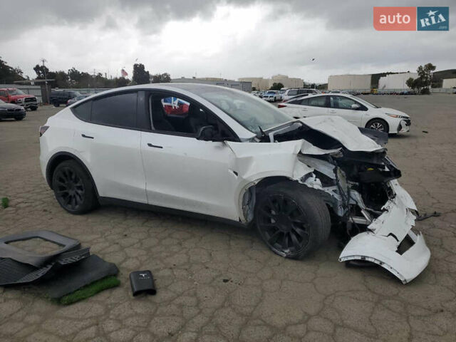 Белый Тесла Model Y, объемом двигателя 0 л и пробегом 62 тыс. км за 21750 $, фото 2 на Automoto.ua
