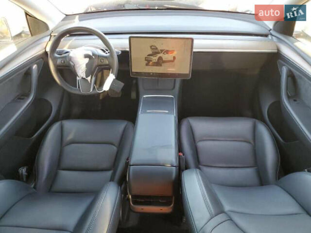 Белый Тесла Model Y, объемом двигателя 0 л и пробегом 52 тыс. км за 19800 $, фото 7 на Automoto.ua