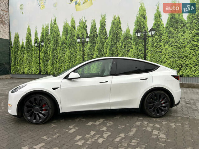 Білий Тесла Model Y, об'ємом двигуна 0 л та пробігом 84 тис. км за 28300 $, фото 1 на Automoto.ua