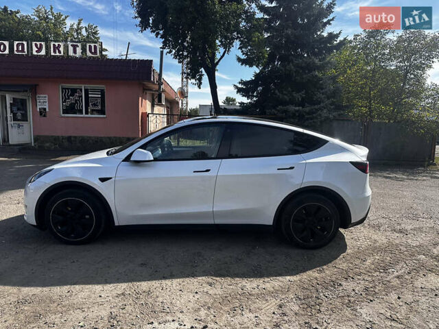 Белый Тесла Model Y, объемом двигателя 0 л и пробегом 73 тыс. км за 25000 $, фото 2 на Automoto.ua