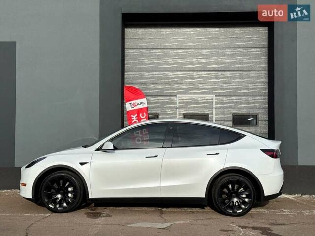 Белый Тесла Model Y, объемом двигателя 0 л и пробегом 89 тыс. км за 30999 $, фото 5 на Automoto.ua