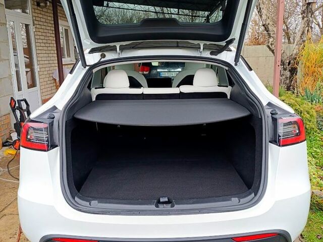 Белый Тесла Model Y, объемом двигателя 0.33 л и пробегом 53 тыс. км за 29000 $, фото 2 на Automoto.ua