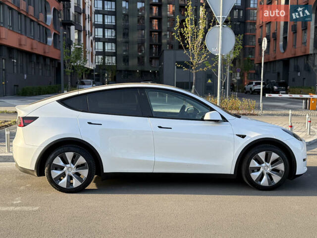 Білий Тесла Model Y, об'ємом двигуна 0 л та пробігом 55 тис. км за 33014 $, фото 15 на Automoto.ua