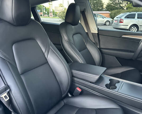 Білий Тесла Model Y, об'ємом двигуна 0 л та пробігом 45 тис. км за 27500 $, фото 46 на Automoto.ua