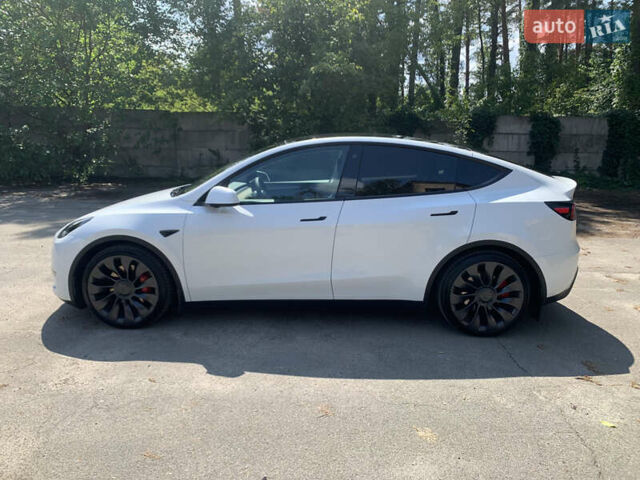 Белый Тесла Model Y, объемом двигателя 0 л и пробегом 64 тыс. км за 28500 $, фото 5 на Automoto.ua