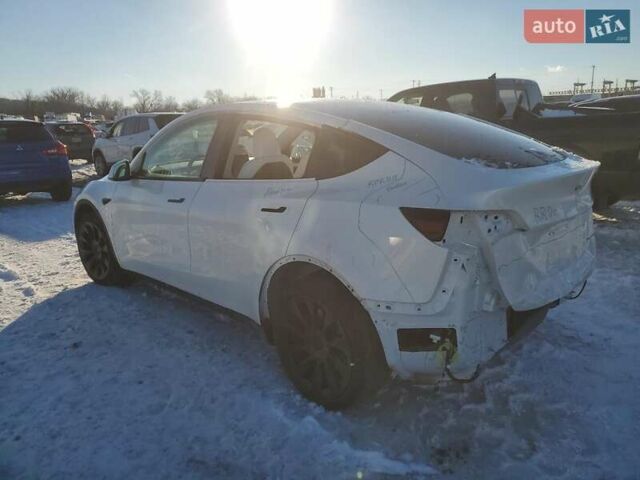Белый Тесла Model Y, объемом двигателя 0 л и пробегом 25 тыс. км за 13000 $, фото 1 на Automoto.ua
