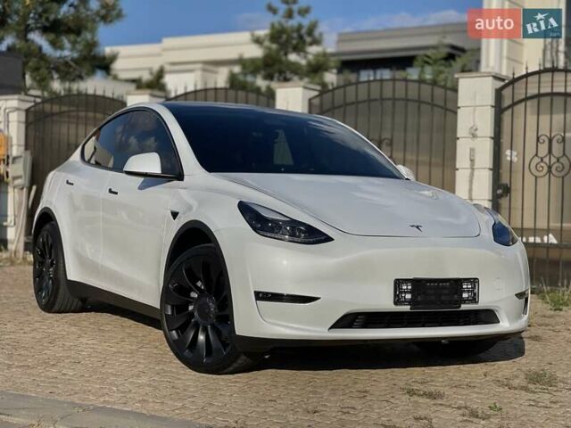 Белый Тесла Model Y, объемом двигателя 0 л и пробегом 26 тыс. км за 28700 $, фото 1 на Automoto.ua