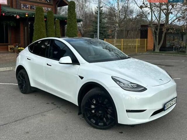 Білий Тесла Model Y, об'ємом двигуна 0 л та пробігом 49 тис. км за 27500 $, фото 1 на Automoto.ua