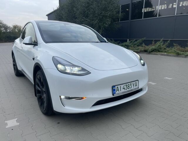 Белый Тесла Model Y, объемом двигателя 0 л и пробегом 64 тыс. км за 28500 $, фото 2 на Automoto.ua