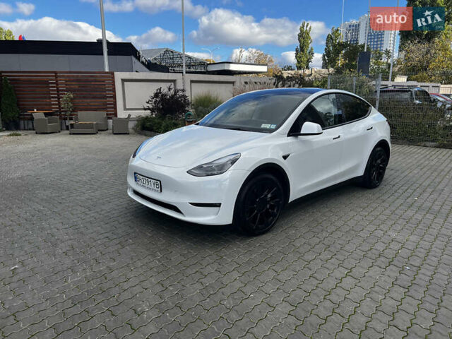 Белый Тесла Model Y, объемом двигателя 0 л и пробегом 98 тыс. км за 28000 $, фото 3 на Automoto.ua
