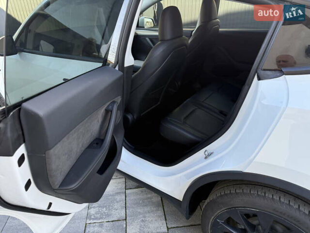 Білий Тесла Model Y, об'ємом двигуна 0 л та пробігом 49 тис. км за 24900 $, фото 3 на Automoto.ua