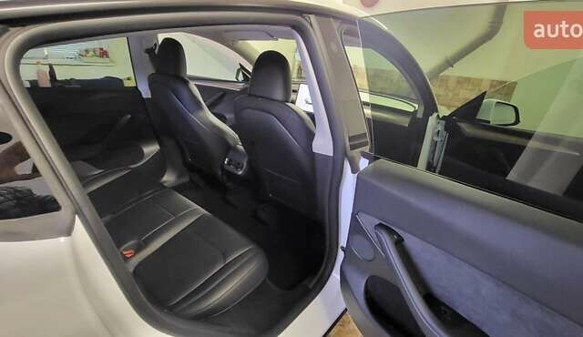 Белый Тесла Model Y, объемом двигателя 0 л и пробегом 56 тыс. км за 26500 $, фото 18 на Automoto.ua