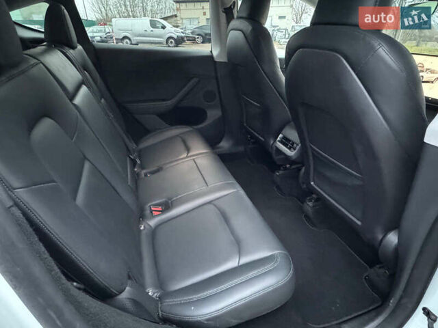 Білий Тесла Model Y, об'ємом двигуна 0 л та пробігом 50 тис. км за 21900 $, фото 25 на Automoto.ua