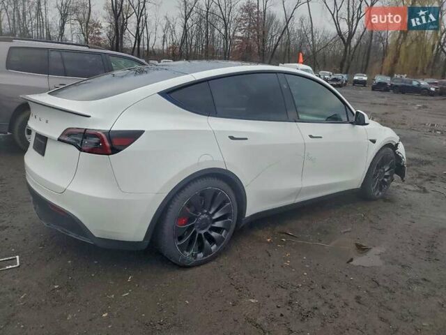 Белый Тесла Model Y, объемом двигателя 0 л и пробегом 34 тыс. км за 19000 $, фото 3 на Automoto.ua