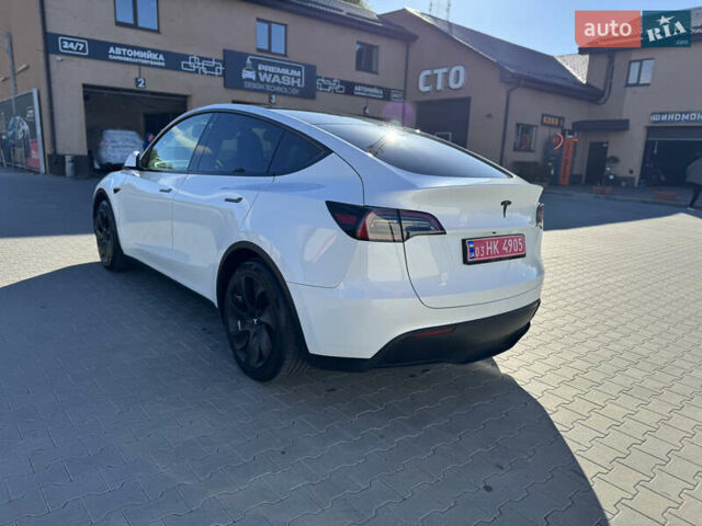 Белый Тесла Model Y, объемом двигателя 0 л и пробегом 26 тыс. км за 29900 $, фото 77 на Automoto.ua