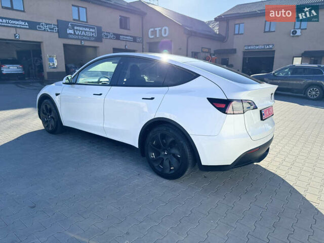 Белый Тесла Model Y, объемом двигателя 0 л и пробегом 26 тыс. км за 29900 $, фото 14 на Automoto.ua