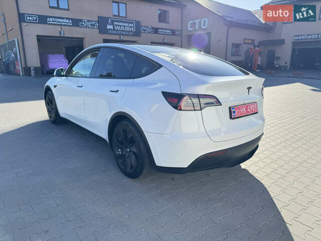 Белый Тесла Model Y, объемом двигателя 0 л и пробегом 26 тыс. км за 29900 $, фото 75 на Automoto.ua