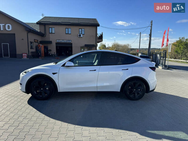 Белый Тесла Model Y, объемом двигателя 0 л и пробегом 26 тыс. км за 29900 $, фото 1 на Automoto.ua