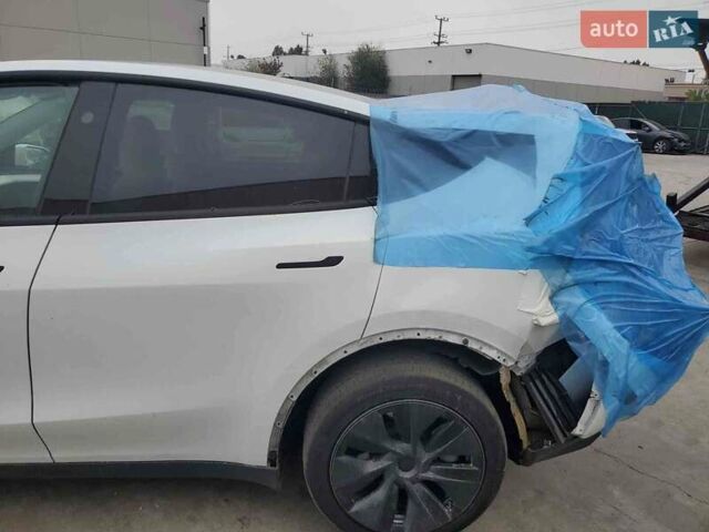 Белый Тесла Model Y, объемом двигателя 0 л и пробегом 50 тыс. км за 18800 $, фото 1 на Automoto.ua