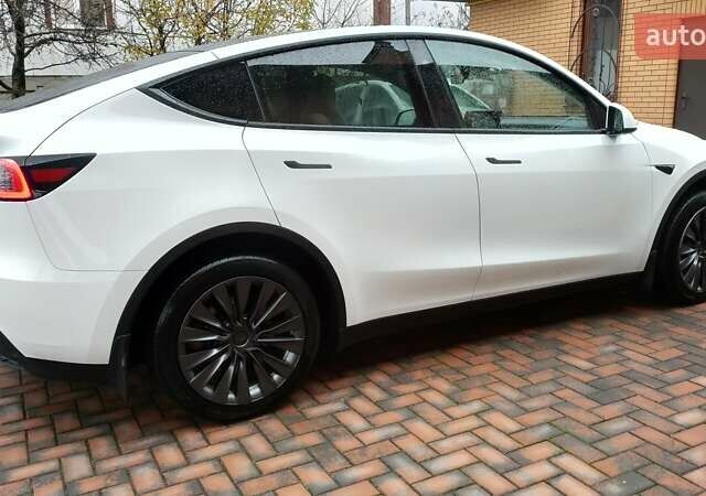 Белый Тесла Model Y, объемом двигателя 0 л и пробегом 8 тыс. км за 27300 $, фото 9 на Automoto.ua