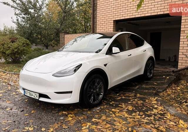 Белый Тесла Model Y, объемом двигателя 0 л и пробегом 20 тыс. км за 31500 $, фото 1 на Automoto.ua