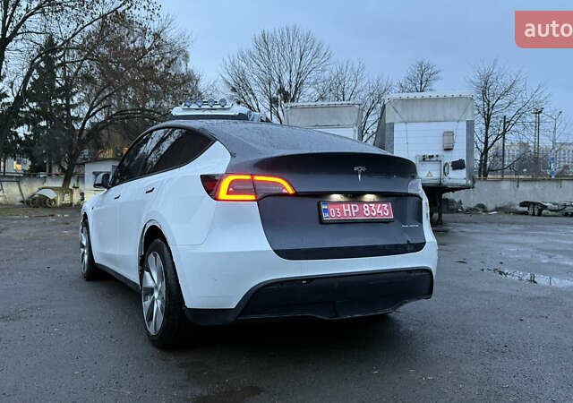 Білий Тесла Model Y, об'ємом двигуна 0 л та пробігом 96 тис. км за 19900 $, фото 5 на Automoto.ua