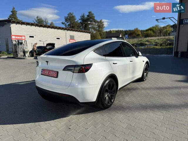 Белый Тесла Model Y, объемом двигателя 0 л и пробегом 26 тыс. км за 29900 $, фото 76 на Automoto.ua