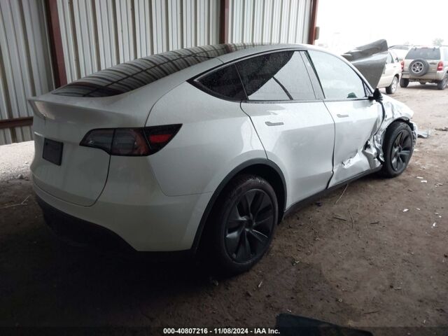 Белый Тесла Model Y, объемом двигателя 0 л и пробегом 4 тыс. км за 16650 $, фото 5 на Automoto.ua