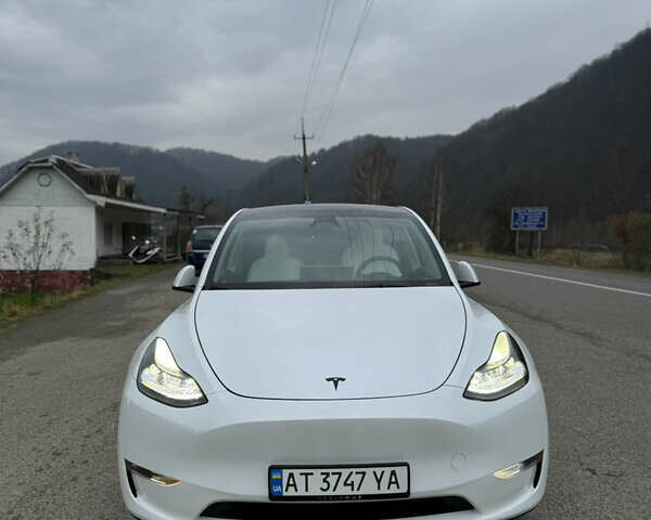 Белый Тесла Model Y, объемом двигателя 0 л и пробегом 23 тыс. км за 34000 $, фото 1 на Automoto.ua
