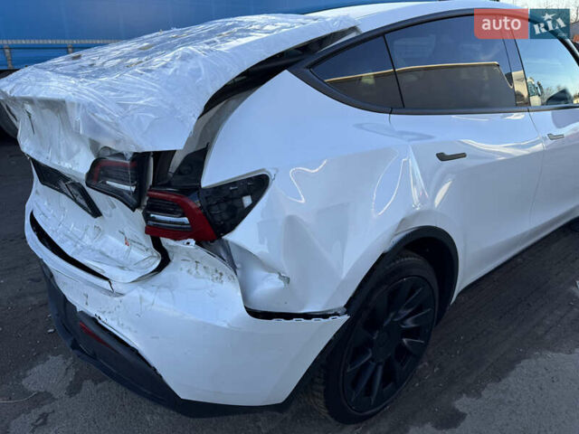 Білий Тесла Model Y, об'ємом двигуна 0 л та пробігом 47 тис. км за 23700 $, фото 4 на Automoto.ua