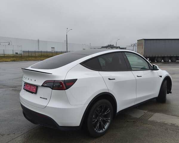 Белый Тесла Model Y, объемом двигателя 0 л и пробегом 19 тыс. км за 28800 $, фото 6 на Automoto.ua