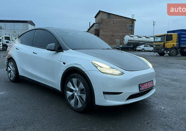 Білий Тесла Model Y, об'ємом двигуна 0 л та пробігом 96 тис. км за 19900 $, фото 7 на Automoto.ua