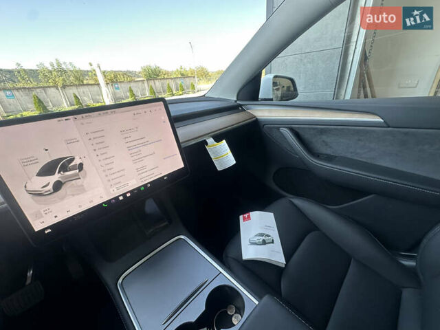 Білий Тесла Model Y, об'ємом двигуна 0 л та пробігом 5 тис. км за 28300 $, фото 10 на Automoto.ua