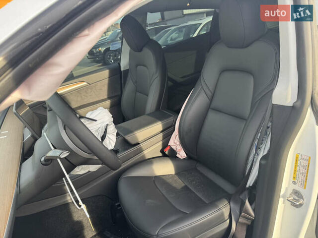 Белый Тесла Model Y, объемом двигателя 0 л и пробегом 5 тыс. км за 17800 $, фото 20 на Automoto.ua