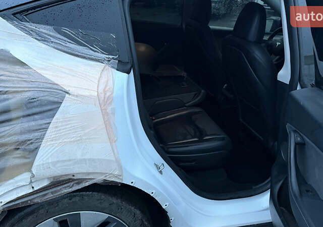 Білий Тесла Model Y, об'ємом двигуна 0 л та пробігом 96 тис. км за 19900 $, фото 21 на Automoto.ua