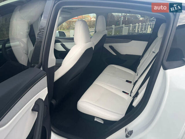 Белый Тесла Model Y, объемом двигателя 0 л и пробегом 1 тыс. км за 61141 $, фото 30 на Automoto.ua