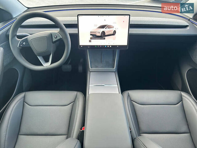Белый Тесла Model Y, объемом двигателя 0 л и пробегом 1 тыс. км за 63500 $, фото 22 на Automoto.ua