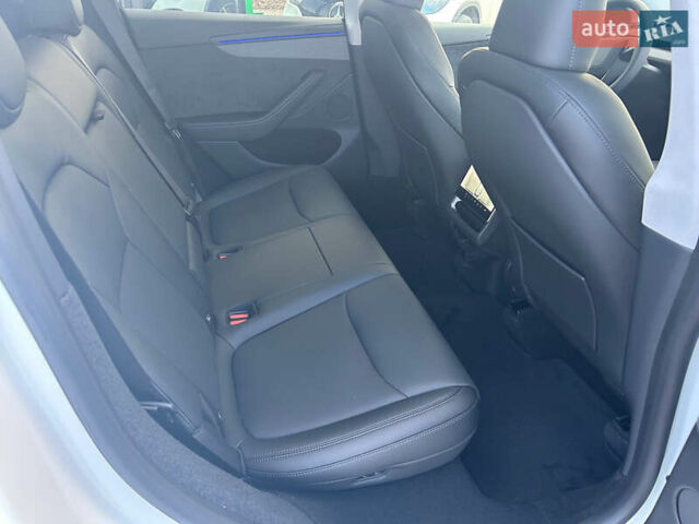 Белый Тесла Model Y, объемом двигателя 0 л и пробегом 1 тыс. км за 63500 $, фото 18 на Automoto.ua