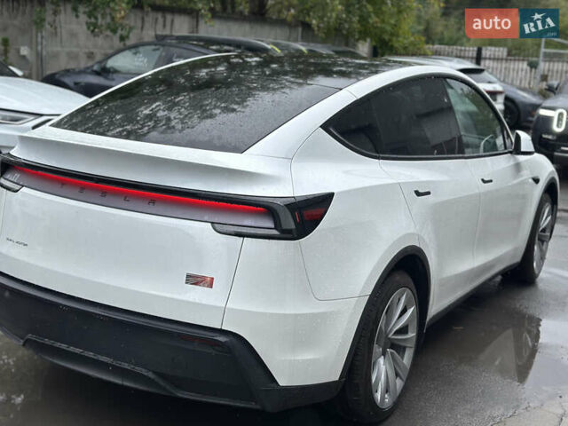 Белый Тесла Model Y, объемом двигателя 0 л и пробегом 1 тыс. км за 58999 $, фото 2 на Automoto.ua