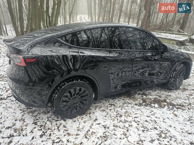 Черный Тесла Model Y, объемом двигателя 0 л и пробегом 90 тыс. км за 22900 $, фото 3 на Automoto.ua