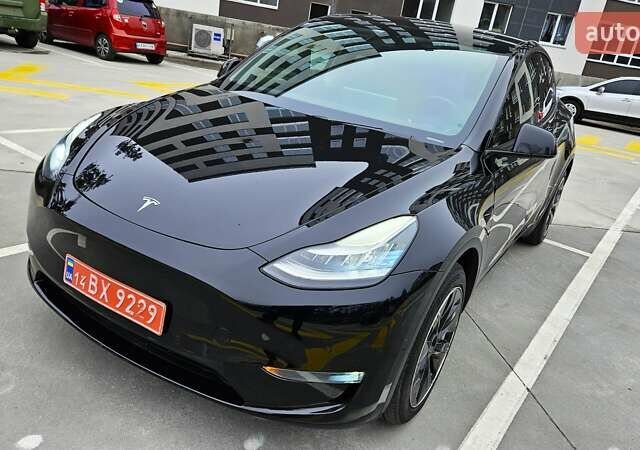 Черный Тесла Model Y, объемом двигателя 0 л и пробегом 136 тыс. км за 23990 $, фото 7 на Automoto.ua