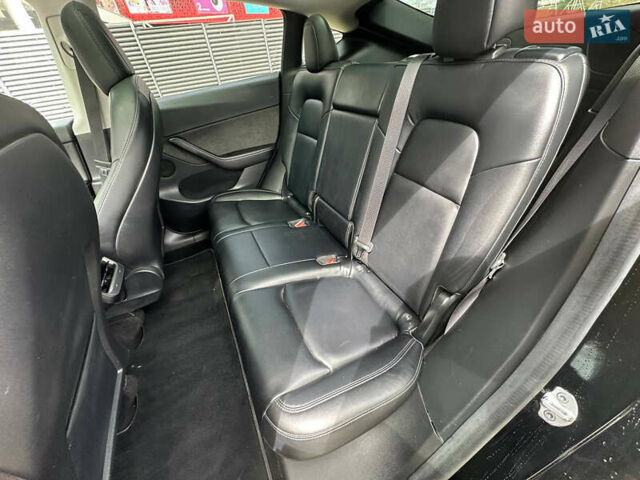 Черный Тесла Model Y, объемом двигателя 0 л и пробегом 49 тыс. км за 19900 $, фото 12 на Automoto.ua