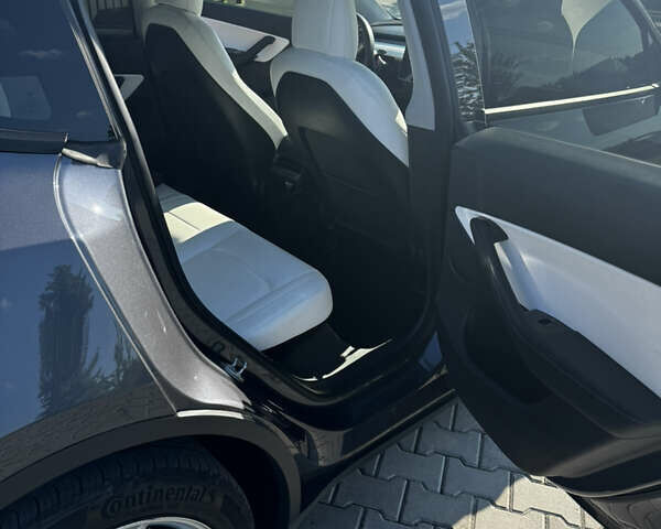 Черный Тесла Model Y, объемом двигателя 0 л и пробегом 90 тыс. км за 25000 $, фото 11 на Automoto.ua