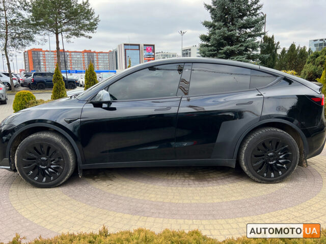 Черный Тесла Model Y, объемом двигателя 75 л и пробегом 72 тыс. км за 29800 $, фото 3 на Automoto.ua