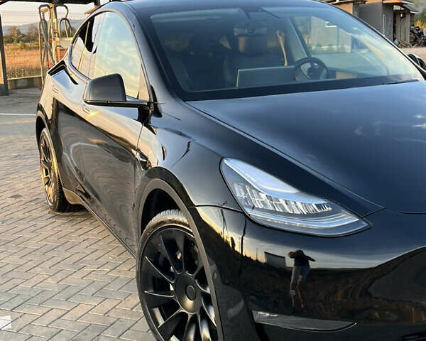 Черный Тесла Model Y, объемом двигателя 0 л и пробегом 90 тыс. км за 22500 $, фото 1 на Automoto.ua
