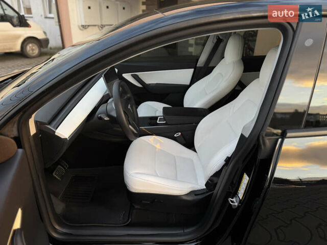 Черный Тесла Model Y, объемом двигателя 0 л и пробегом 149 тыс. км за 20600 $, фото 25 на Automoto.ua
