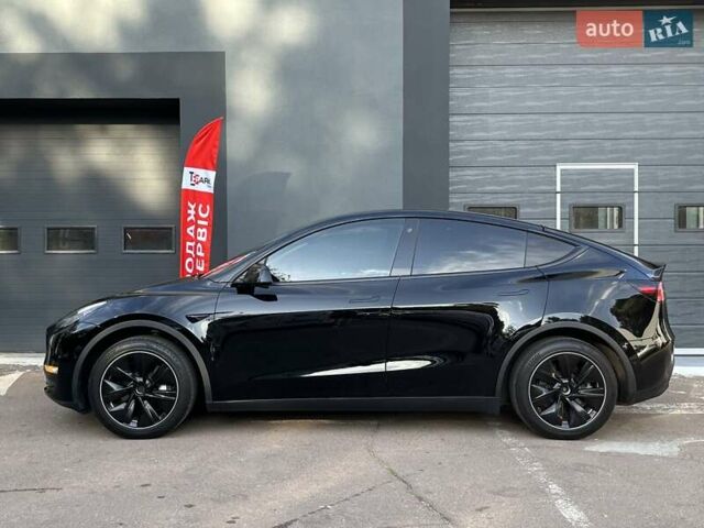 Черный Тесла Model Y, объемом двигателя 0 л и пробегом 136 тыс. км за 24999 $, фото 4 на Automoto.ua