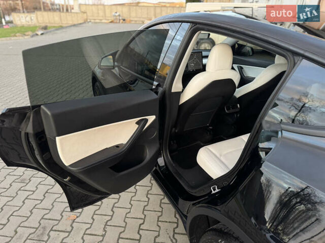 Черный Тесла Model Y, объемом двигателя 0 л и пробегом 149 тыс. км за 20600 $, фото 44 на Automoto.ua