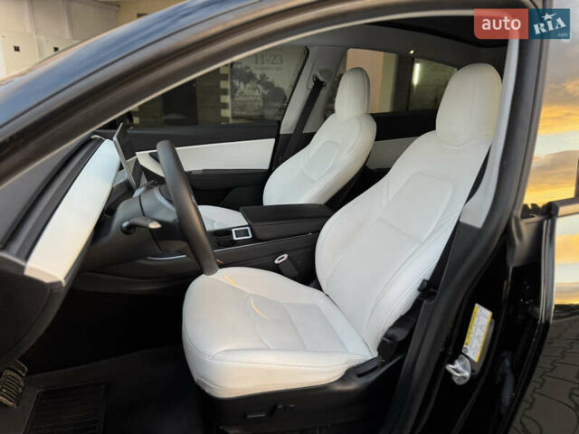 Черный Тесла Model Y, объемом двигателя 0 л и пробегом 149 тыс. км за 20600 $, фото 26 на Automoto.ua