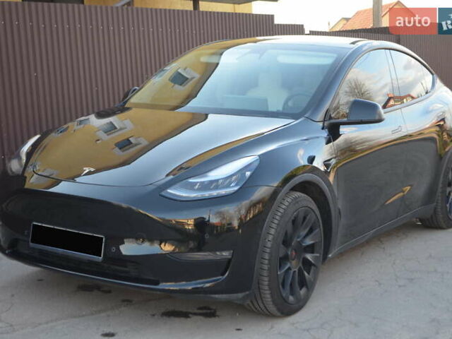 Черный Тесла Model Y, объемом двигателя 0 л и пробегом 77 тыс. км за 21900 $, фото 1 на Automoto.ua